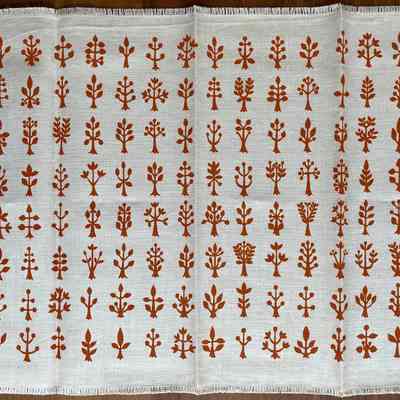 White napkin with copper printing.
