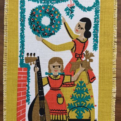2. Woman and child decorating for the holidays.