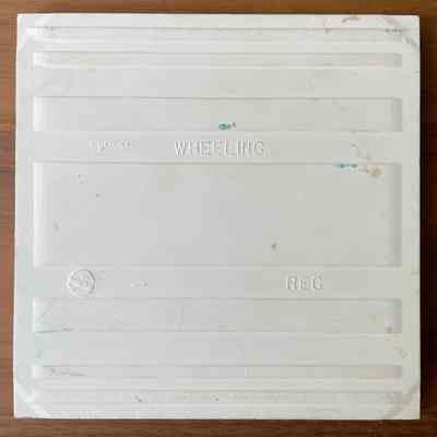Tile back with maker’s mark and year of tile blank production (195656).