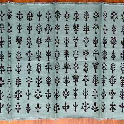 Napkin: black print on blue linen.