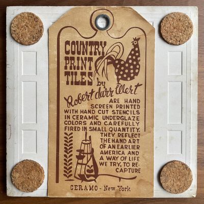 Tile back with Country Print Tiles label hanger and cork pads.