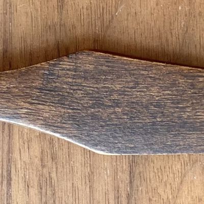 Carved walnut cheese knife.