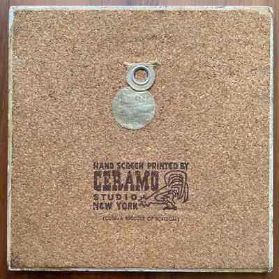 Tile back with Ceramo Studio imprint.