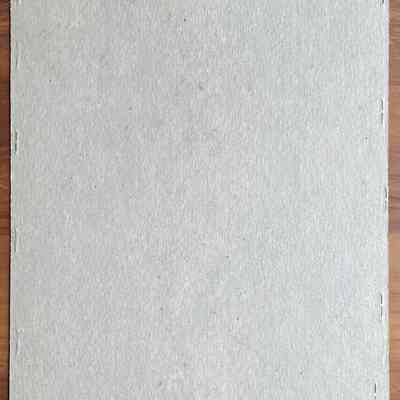 Chipboard backing panel.