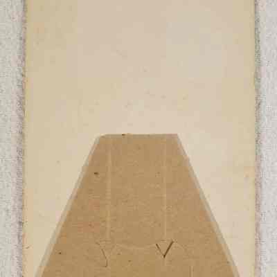 Back of display card with attached easel.
