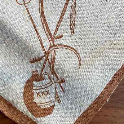 Harvest tools and liquor jug.