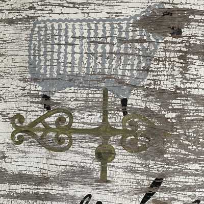 Detail of hand painted sheep weathervane.