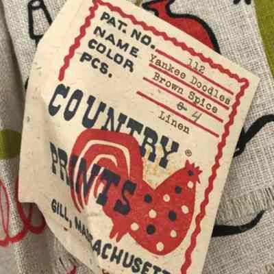 Country Prints tag with product info.