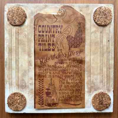 Tile back with cork pads and Country Print Tiles label hanger.