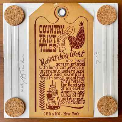 Tile back with Country Print Tiles label hanger and cork pads.