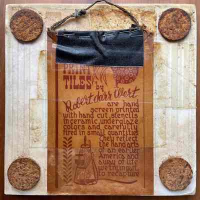 Tile back with partial Country Print Tiles label hanger and cork pads.