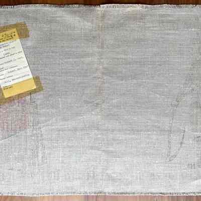 Back of placemat with temporary accession tag from the Worcester Art Museum, 1952
