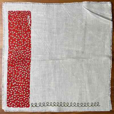 Napkin in red.: Collection of Sara Leeper.