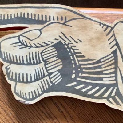 Large manicule or pointing hand (photomechanical reproduction), approximately 7” x 12”.