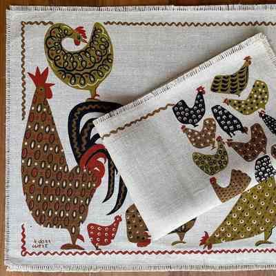 Matching placemat set: New Flock 123 in mustard.: Collection of Sara Leeper.
