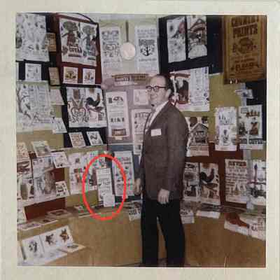 Bob Wert in a Country Prints trade show booth, c.1964. Sign in red oval. Note secondary display tile at bottom of sign.: Collection of Sara Leeper.