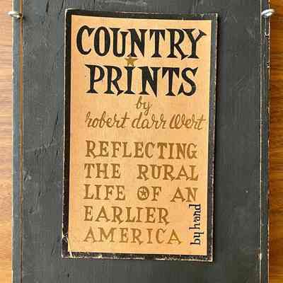 Story card affixed to back of an early Country Prints box frame.