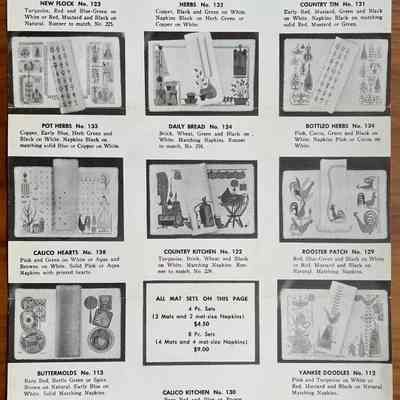 Brochure interior showing fourteen placemat sets with napkins.