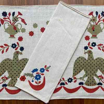 Matching placemat set in red.: Collection of Sara Leeper. Image: PKM