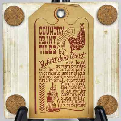 Tile back with Country Print Tiles label hanger and cork pads.