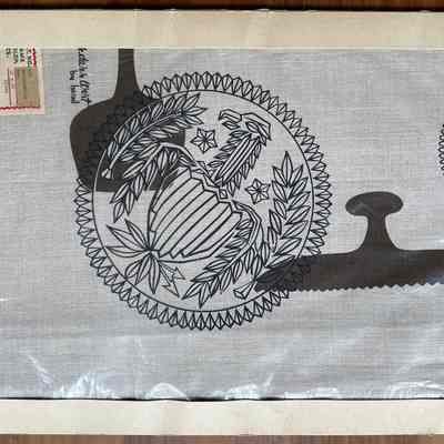 Pack containing a tablecloth.