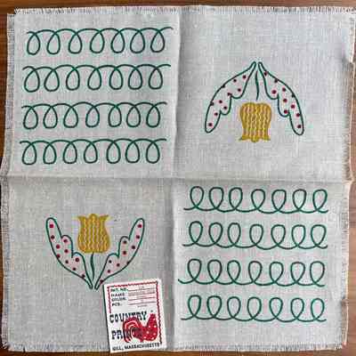 Napkin with Country Prints product tag.