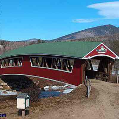 A New Hampshire covered bridge that may be the inspiration for the bridge illustrated in the Walk Your Horses U219 towel/wallhanging.: Image: nhliving.com