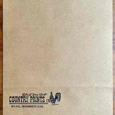 Brochure open with mailer face at bottom.