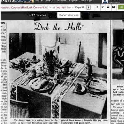 Deck the Halls placemat/napkin folded on plates in this editorial.: Image: The Hartford Courant/Associated Press, December 18, 1960; Newspapers.com