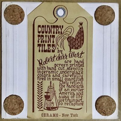 Tile back with Country Print Tiles label hanger and cork pads.