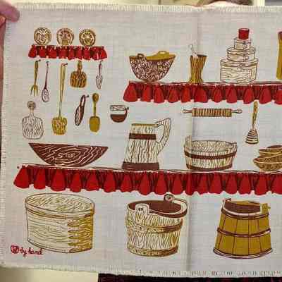 Woodenware placemat with accession label and design name.: From the Uconn Historic Costume and Textile Collection. Image: Lynne Zacek Bassett