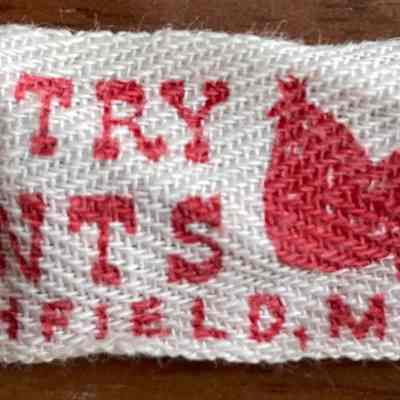 Country Prints Northfield Mass product tag on hemmed placemat.