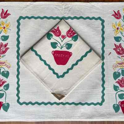 Set with hemmed edges.