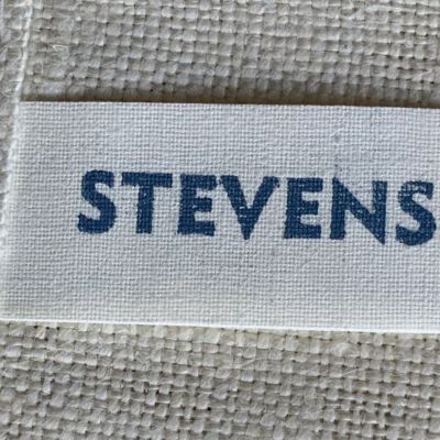 Label for Stevens Linen Associates, Inc.