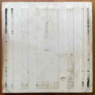 Tile back with Wheeling Ceramics imprint and production date of November 1954 (54 with eleven dots).