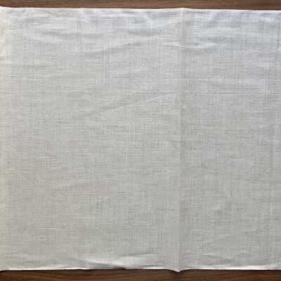 Blank linen backing fabric.: This piece would become the back side of the seat and back cushions.