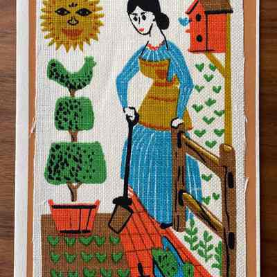 Gardening: A woman tends a newly planted garden in spring. A radiant sun shines overhead as a bird scouts its new home in a birdhouse. A fanciful topiary is planted in a wood slat bucket. (Six colors)