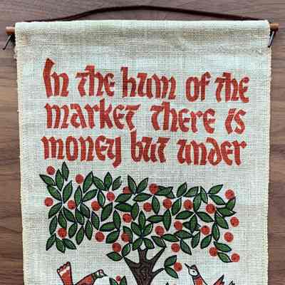 A Kitchen Pockets wallhanging with cookbook and calendar.: PKM collection.