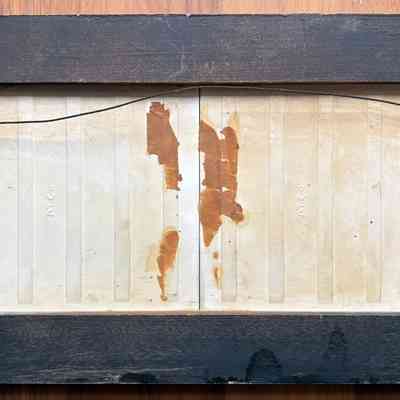 Back of frame showing back of ATCo tile blanks, Country Prints label torn off.