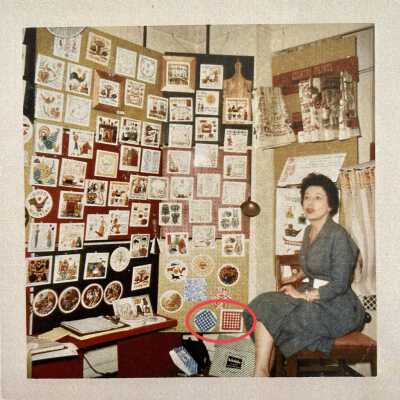 Gingham (TK) tiles in red oval, in a Country Prints trade show booth, 1962-65.