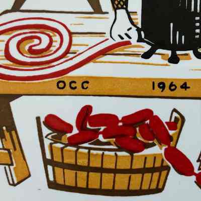 Detail of workbench. “OCC” for Oppenheimer Casing Company, with dates for the company’s 50th anniversary, 1914-1964.