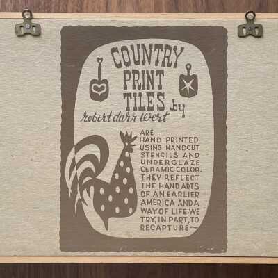 Back of frame with Country Print Tiles branding in brown.