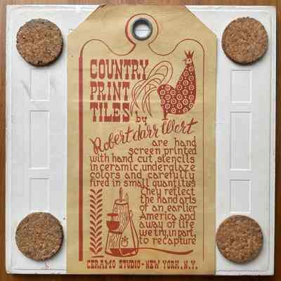 Tile back with Country Print Tiles label hanger and cork pads.