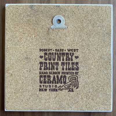Tile back with Country Print Tiles branding.