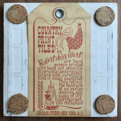 Tile back with Country Print Tiles label-hanger and cork pads.