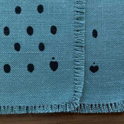 Heart signets on napkin corners.