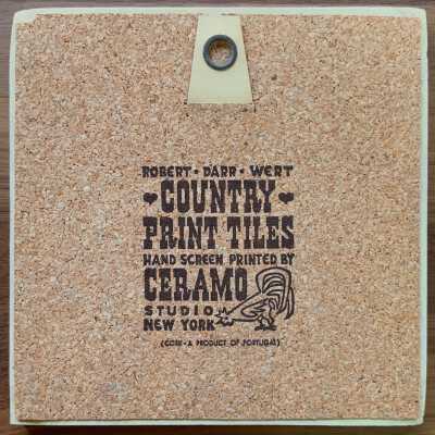 Tile back with Country Print Tiles branding.