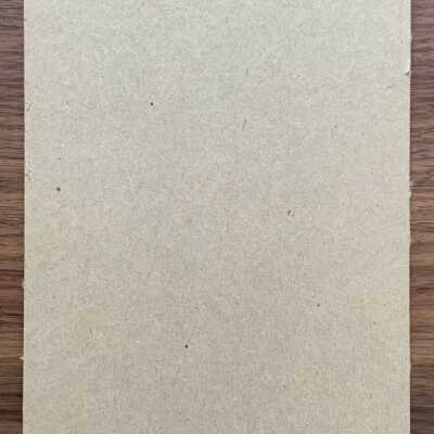 Back of mounting board with possible file notation.