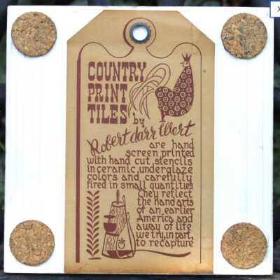 Tile back with Country Print Tiles label hanger and cork pads.