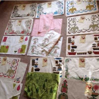 Lot of 25 Country Prints placemats: Applique Eagle 103 blue in upper right corner; a third color option, red, is in lower left corner, one up from bottom.